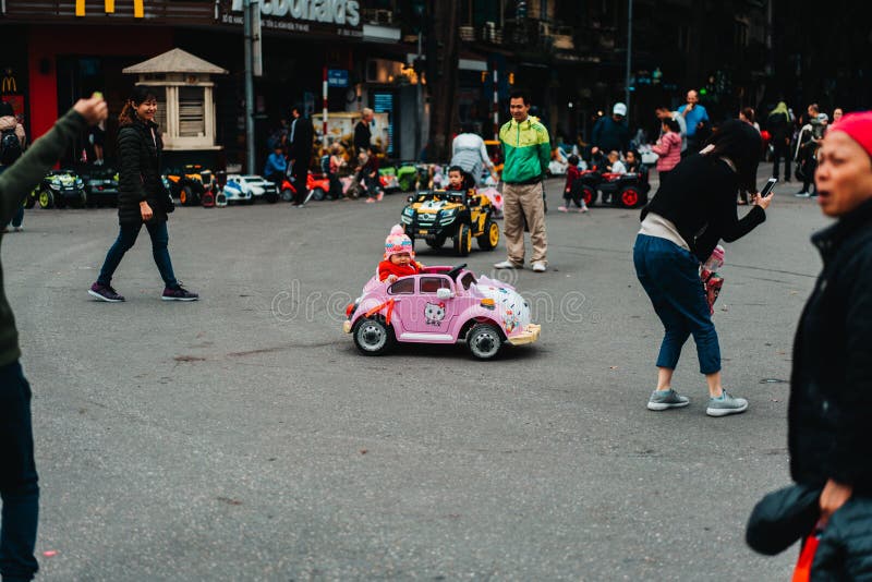 Hanoi, Vietnam, 12.20.18: Life in the street in Hanoi. One of the main roads is closed down at the weekend. stock images Hanoi, Vietnam, 12.20.18: Life in the street in Hanoi. One of the main roads is closed down at the weekend. stock images