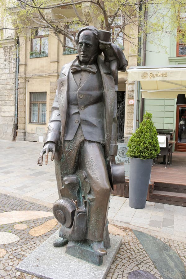 Hans Christian Andersen monumento in piazza Hviezdoslav fotografia stock Hans Christian Andersen monumento in piazza Hviezdoslav fotografia stock