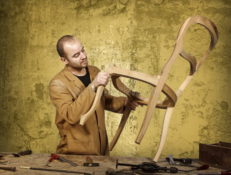 Fine portrait of craftsman at work and grunge background. Fine portrait of craftsman at work and grunge background