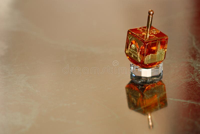A Hanukkah spinning top. stock image. Image of glass 16812233