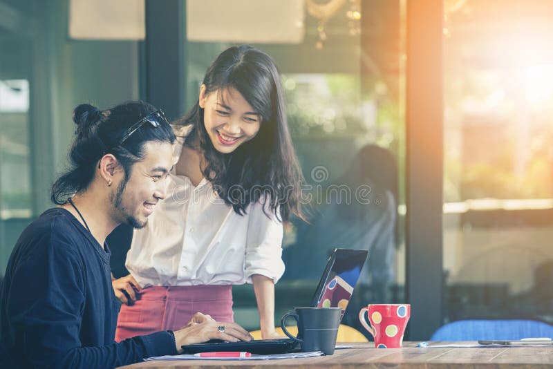 Happiness emotion of asian younger man and woman ,freelance team