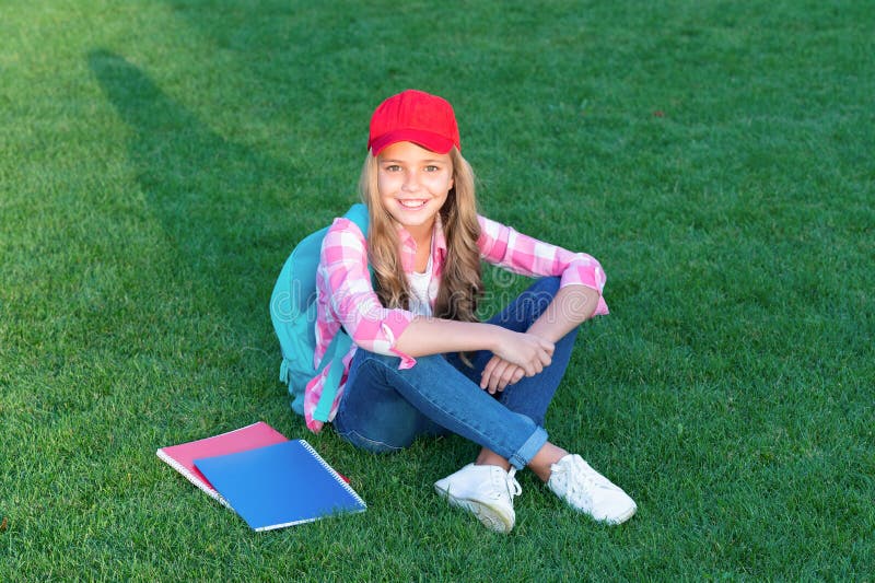 Happy Adolescent Girl Sitting On Grass After School Education Stock Image Image Of Teen