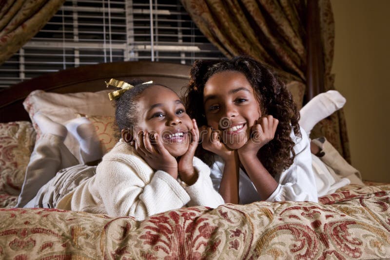 Cute African American Girls Sisters Smiling Stock Image Image Of Lying Brown 10594911