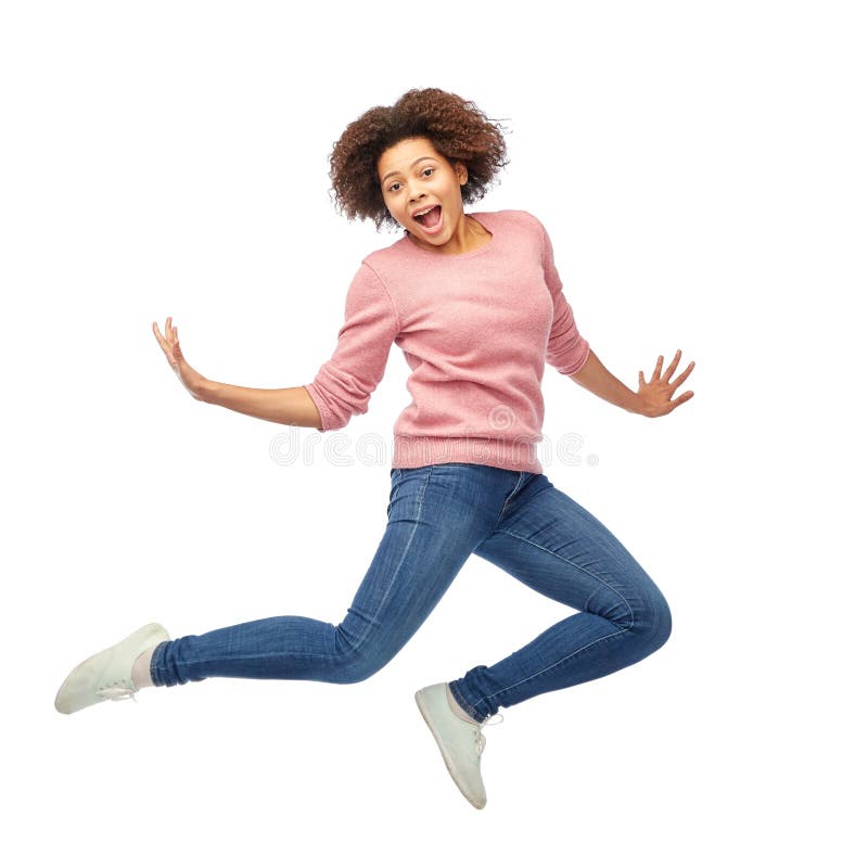 Happy african american woman jumping over white royalty free stock photo Happy african american woman jumping over white royalty free stock photo