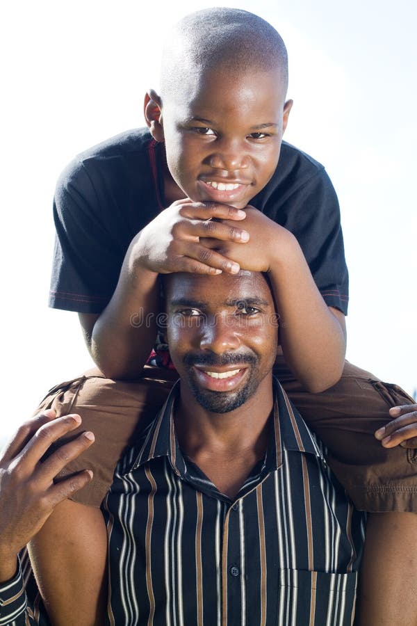 Happy african father and son