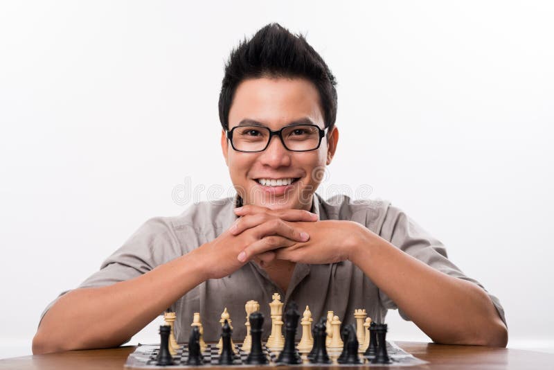 Premium PSD  Bald gratitude southeast asian chess player in soft gaze and  pastel teal pose