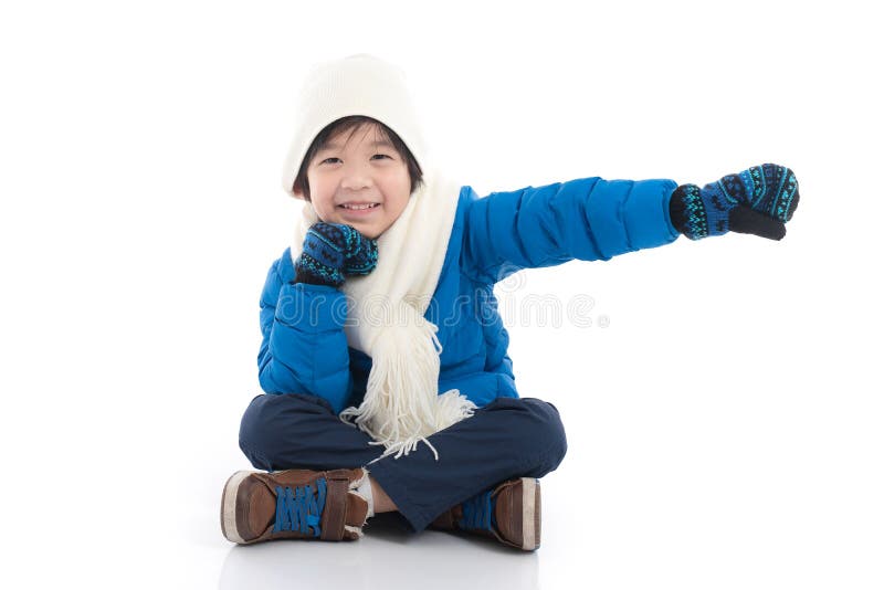 Happy asian child in winter clothes stock image Happy asian child in winter clothes stock image