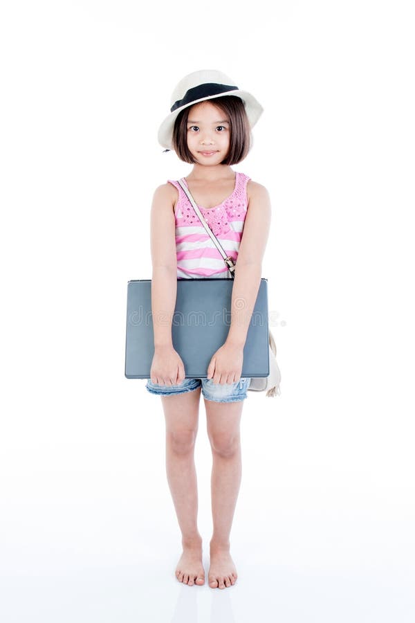Happy asian girl holding laptop royalty free stock image Happy asian girl holding laptop royalty free stock image