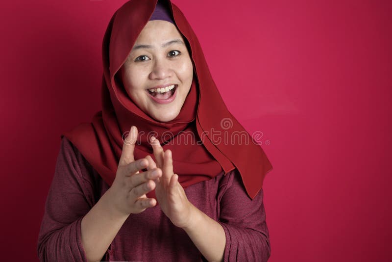 Happy Asian Muslim Woman Clapping Hands royalty free stock photography Happy Asian Muslim Woman Clapping Hands royalty free stock photography