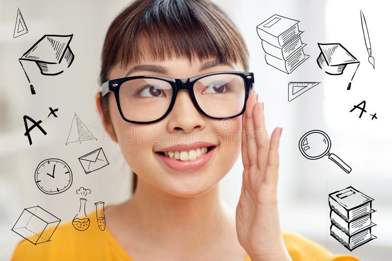 Happy asian young woman in glasses at home