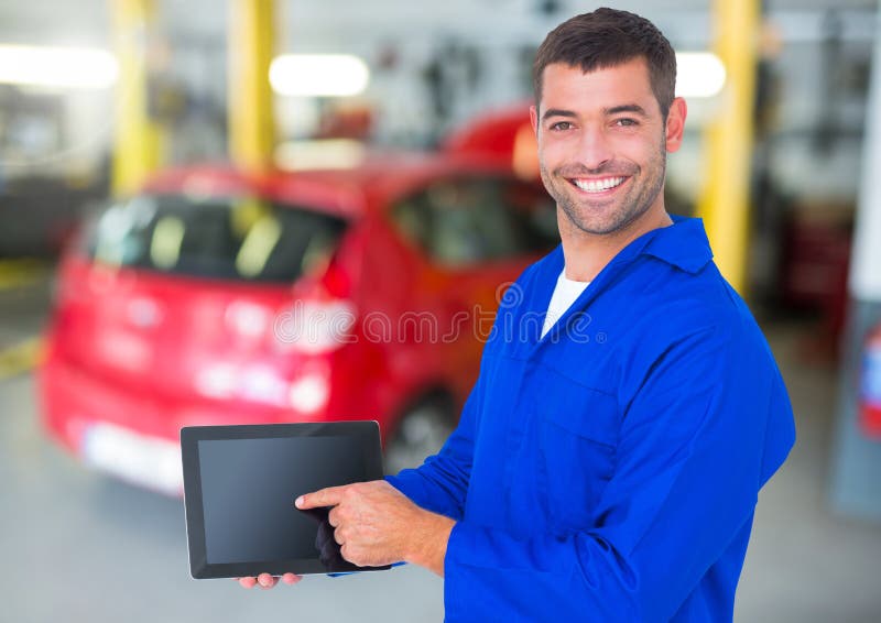 Portrait of a Confident Automobile Mechanic Holding Digital Tablet