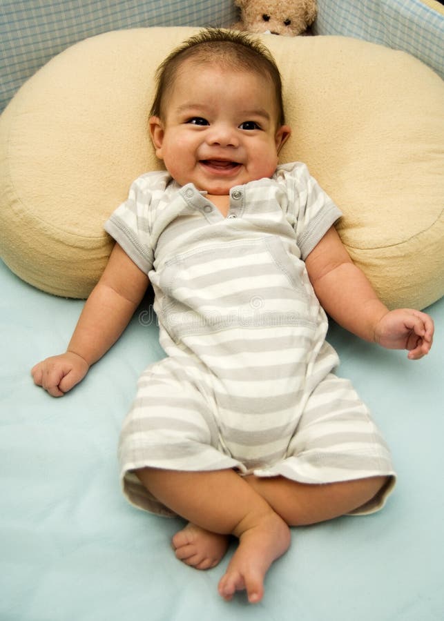 Happy baby in crib