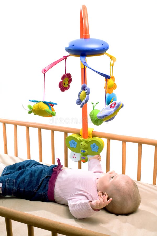 Happy baby on crib stock image Happy baby on crib stock image