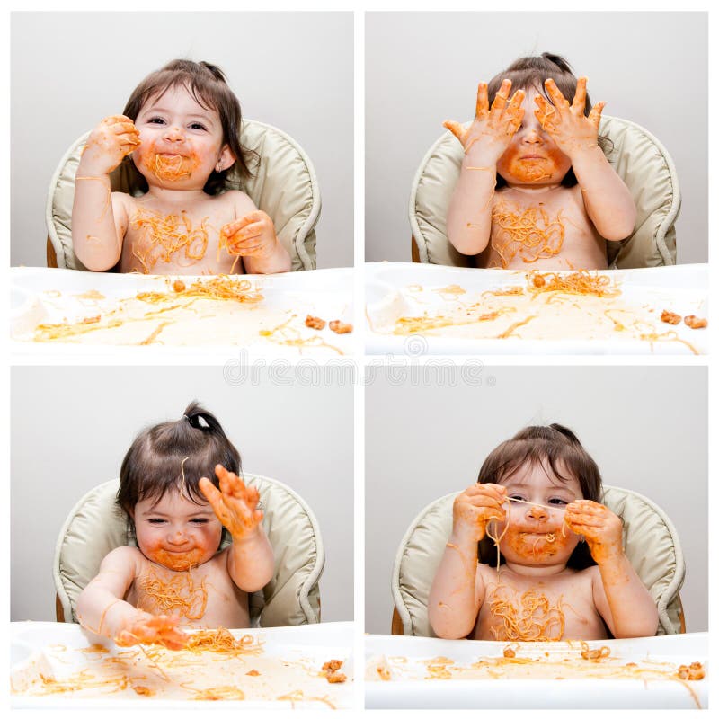 Šťastné dítě baví jíst chaotický ukazující ruce vztahuje na Špagety Anděl Vlasy Těstoviny červené marinara rajčatovou omáčkou.