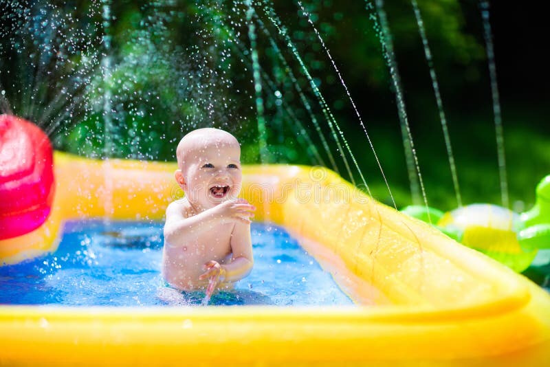 Happy Baby Playing In Swimming Pool Stock Image Image Of Hose