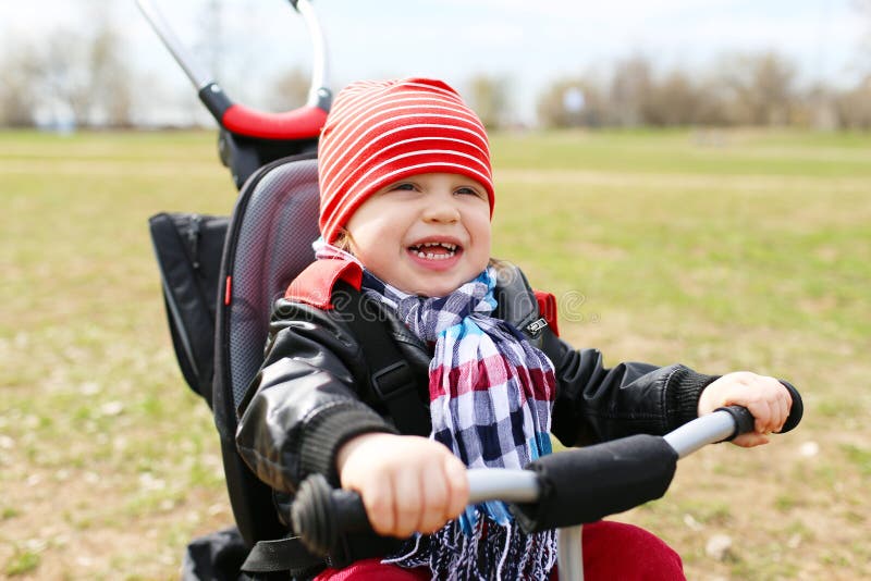 Happy baby on tricycle stock photo. Image of months, cycle 41023084