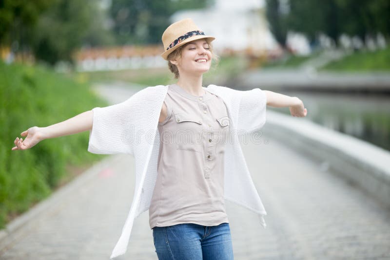 Happy beautiful caucasian woman in summer feeling joyful outdoor stock images Happy beautiful caucasian woman in summer feeling joyful outdoor stock images