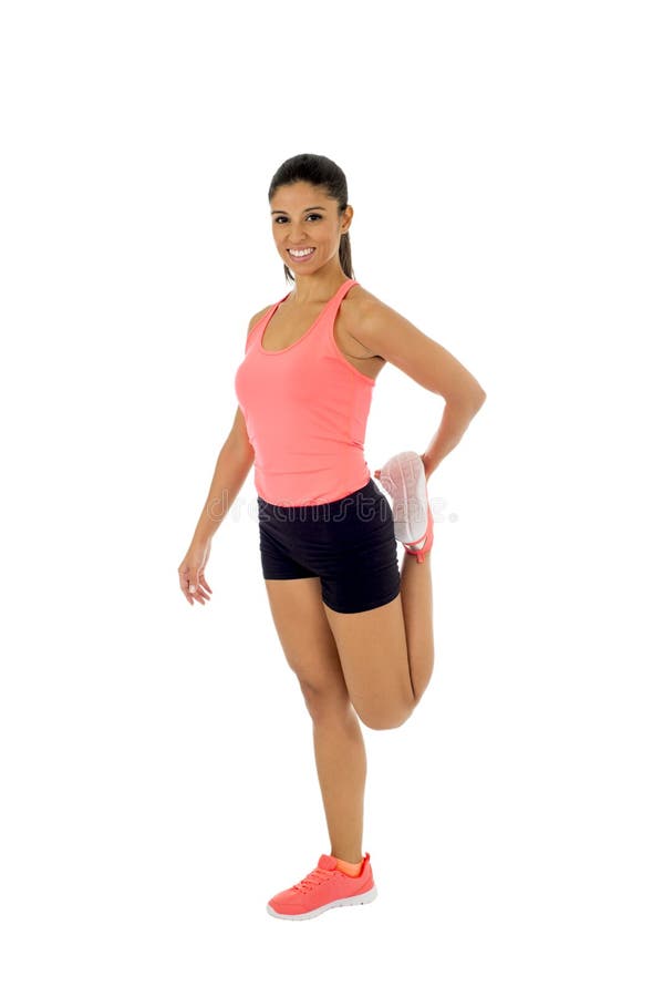 Happy beautiful latin woman stretching body muscles doing fitness workout royalty free stock image Happy beautiful latin woman stretching body muscles doing fitness workout royalty free stock image