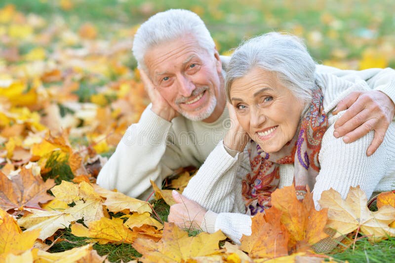 Happy senior woman and man in park royalty free stock image Happy senior woman and man in park royalty free stock image
