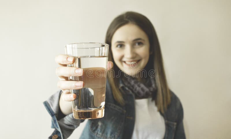 Happy beautiful young woman drinking water. stock images Happy beautiful young woman drinking water. stock images