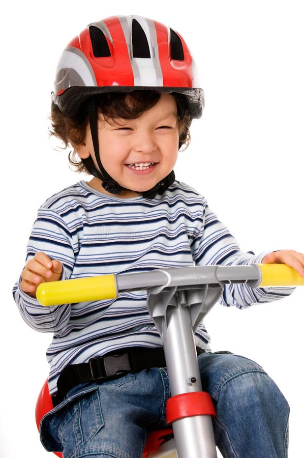 Little boy riding bicycle on white. Little boy riding bicycle on white