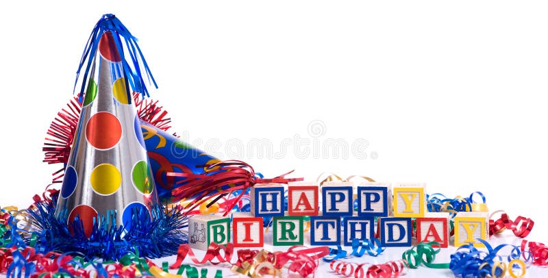 Happy Birthday blocks on a white background with copy space, including a party hat and streamers.