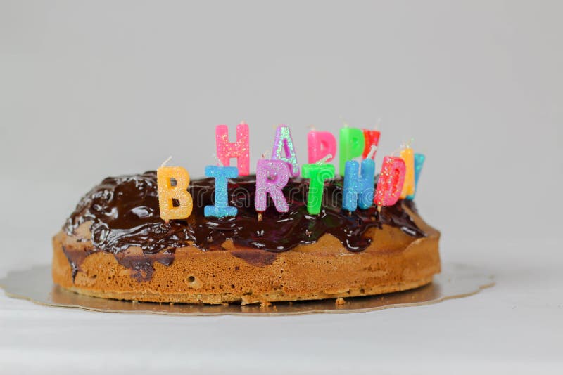 Happy birthday cake with chocolate cover background white blue color red decoration food holiday colorful royalty free stock photography Happy birthday cake with chocolate cover background white blue color red decoration food holiday colorful royalty free stock photography