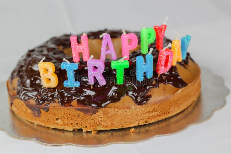 Happy birthday cake with chocolate cover background white blue color red decoration food holiday colorful stock photos Happy birthday cake with chocolate cover background white blue color red decoration food holiday colorful stock photos