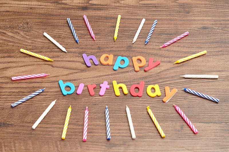 Happy birthday in colorful letters with a collection of birthday candles royalty free stock photo Happy birthday in colorful letters with a collection of birthday candles royalty free stock photo