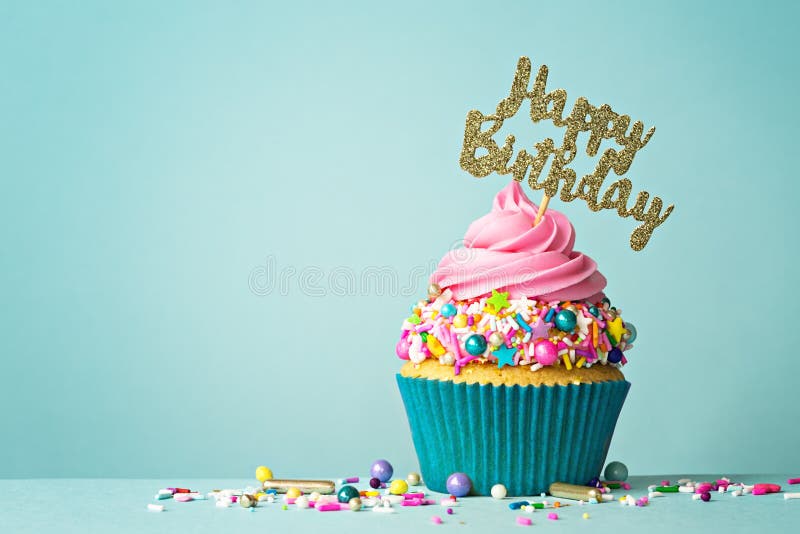 Celebration cupcake with happy birthday message. Celebration cupcake with happy birthday message