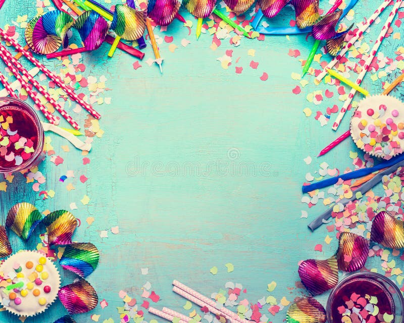 Happy birthday frame. Party tools with cake, drinks and confetti on turquoise shabby chic background, top view, place for text. Happy birthday greeting card