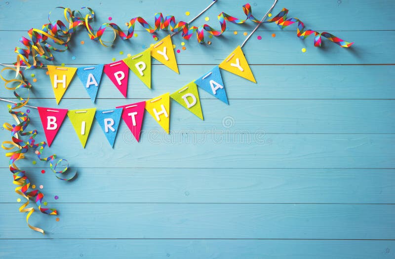 Happy birthday party background with text and colorful tools, top view. Happy birthday greeting card