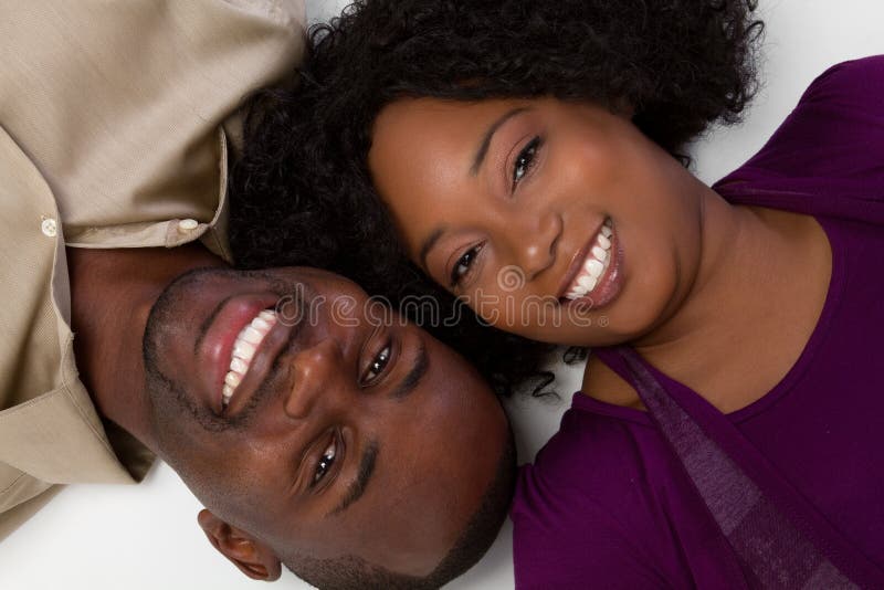 A black couple laughing and talking together 27120844 Stock Photo