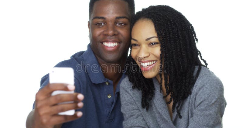 A black couple laughing and talking together 27120844 Stock Photo at  Vecteezy