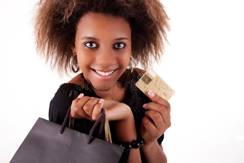 Happy black girl with shopping bags, credit card