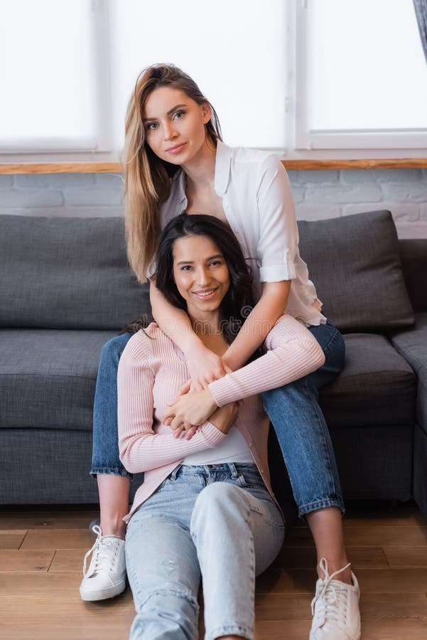 Happy Blonde And Brunette Lesbians Hugging Stock Image Image Of Home