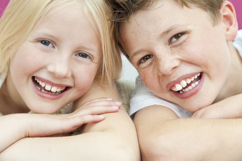 Happy Boy & Girl Brother and Sister Laughing royalty free stock photo Happy Boy & Girl Brother and Sister Laughing royalty free stock photo