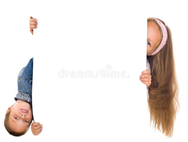 Happy boy and girl hold large white blank