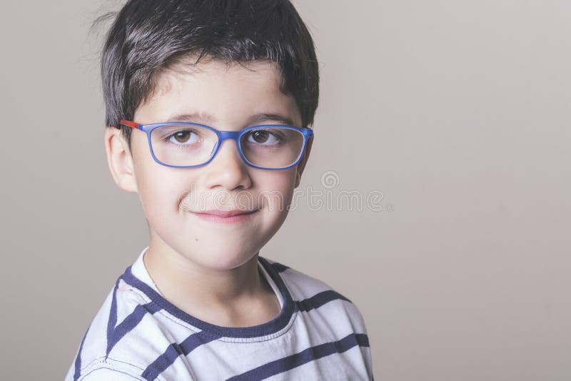 Happy boy with glasses stock photo. Image of thinking 61164026