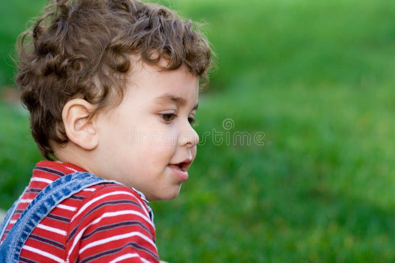 Happy boy on grass