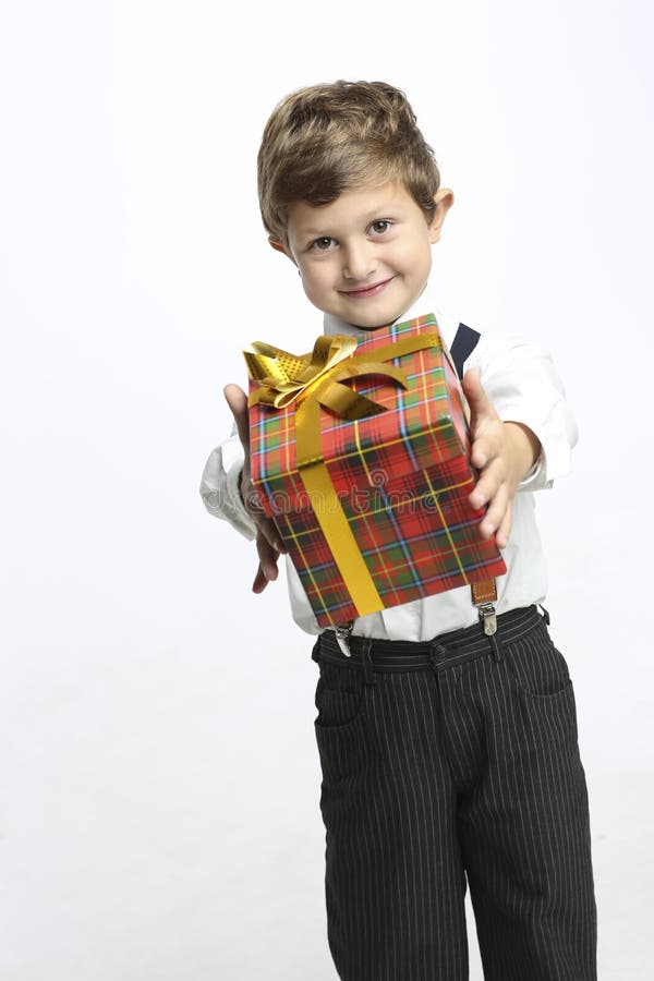 Happy boy offers Christmas gift