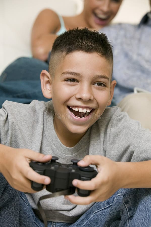 Happy Boy Playing Video Games At Home