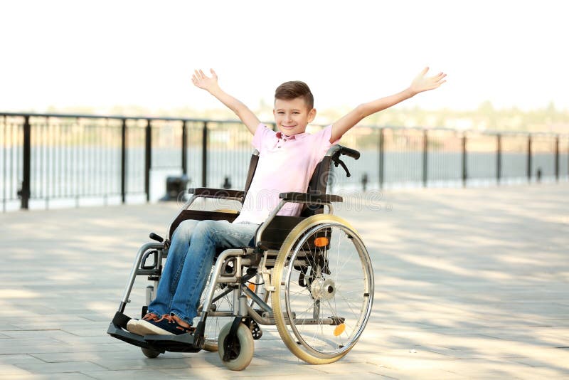 Happy Boy in Wheelchair Outdoors Stock Photo Image of person, health 151245696