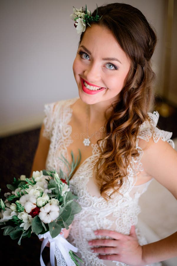 Happy Bride with Beautiful Blue Eyes Poses in Rich Hotel Room Stock ...