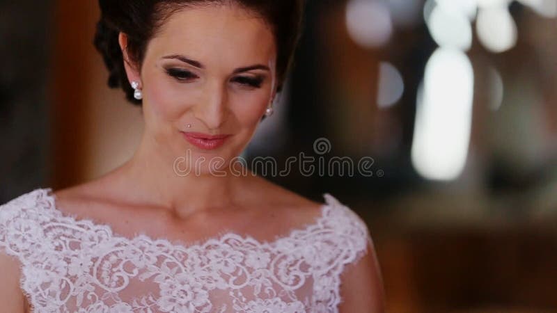 Happy bride wearing and smiling