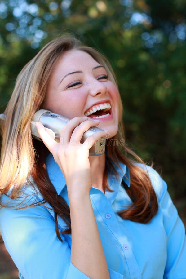 Happy business woman on the telephone