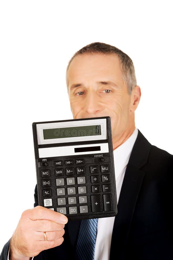 Happy businessman holding a calculator stock photography