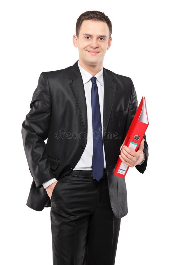 A happy businessman holding a red fascicule with documents isolated on white background. A happy businessman holding a red fascicule with documents isolated on white background