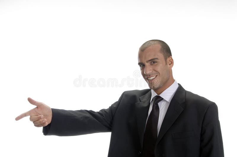 Happy businessman pointing