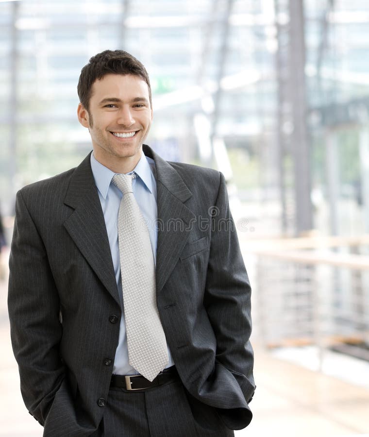 Happy businessman smiling